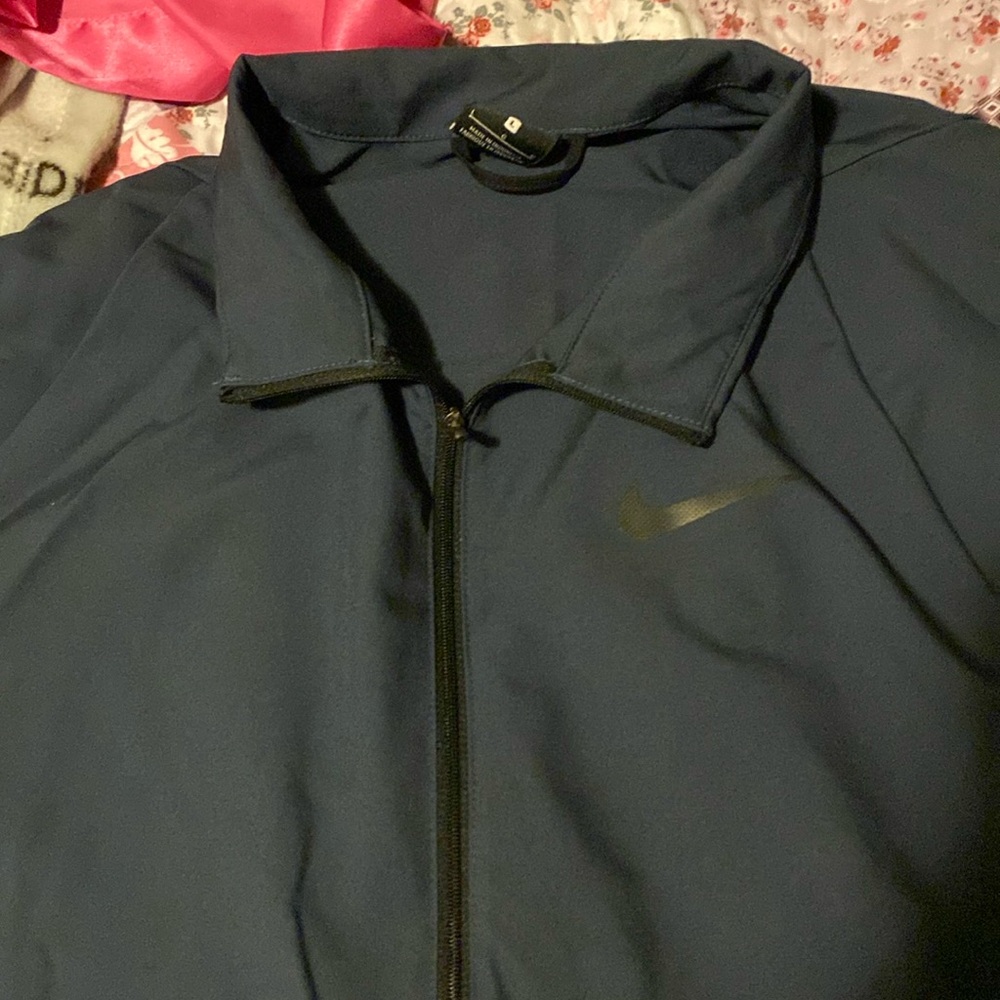 Nike jumpsuit. DriFit jacket and pants